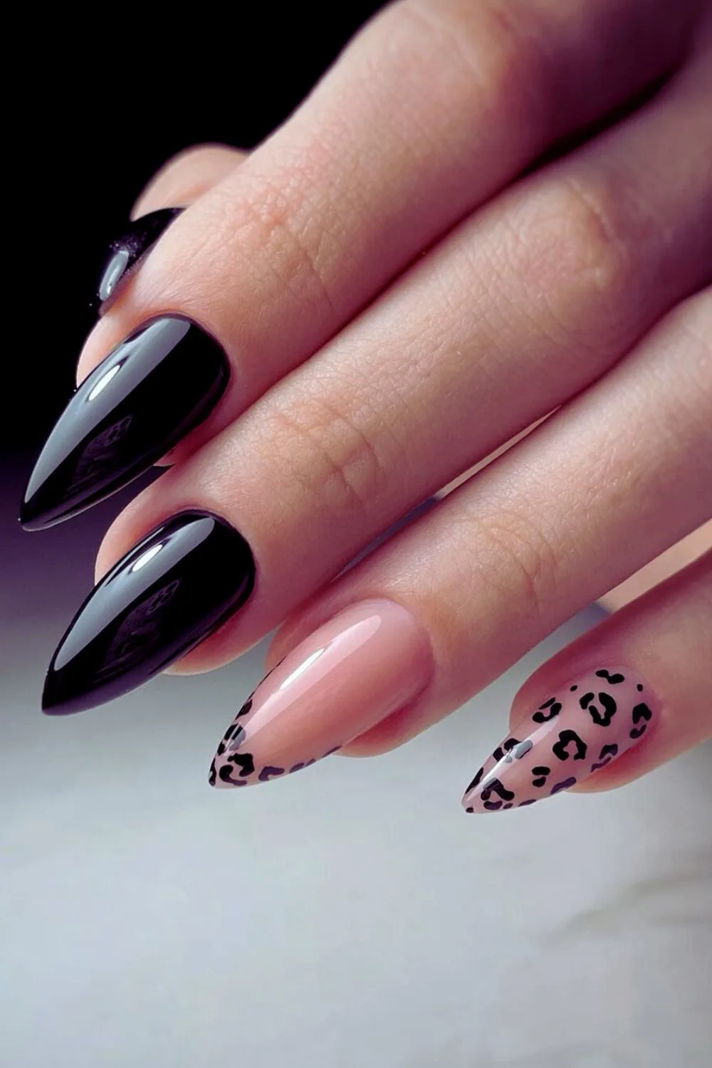 Black and nude nails with leopard details