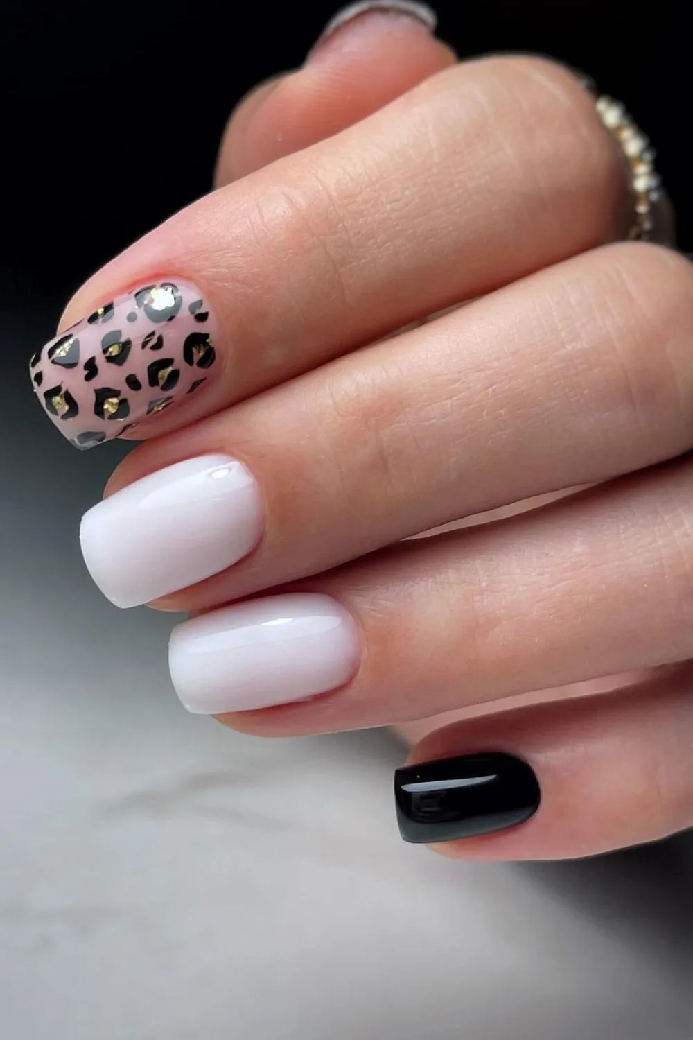 Black and white leopard nails