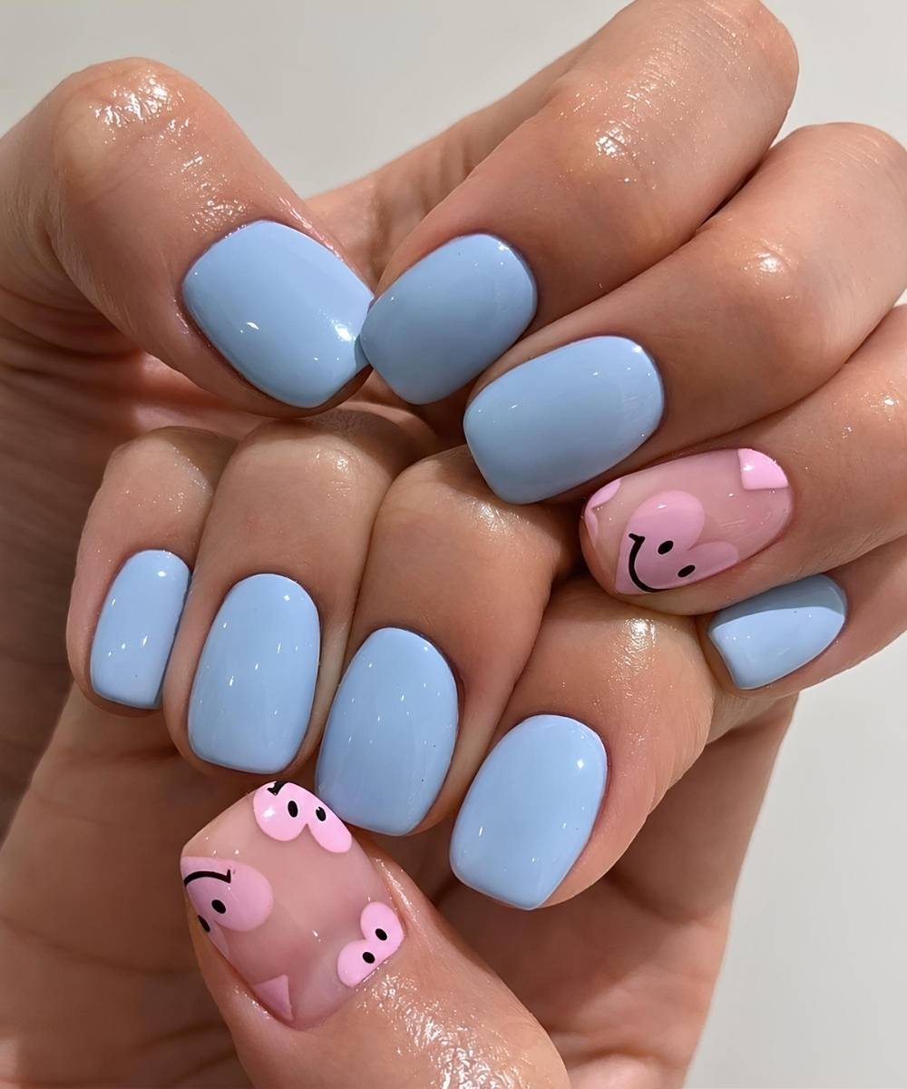 Blue nails with pink smiley hearts