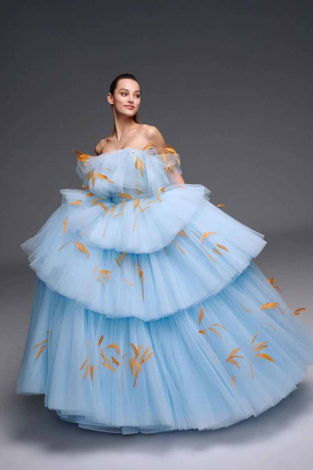 Blue tulle dress with golden accents