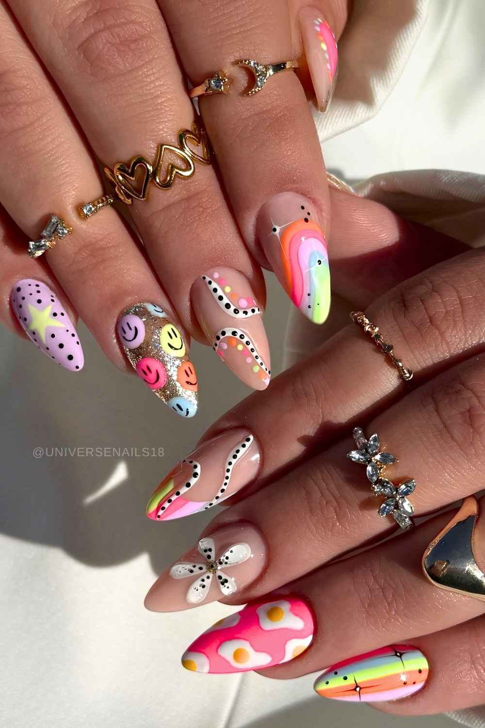 Colorful maximalist manicure with different motifs