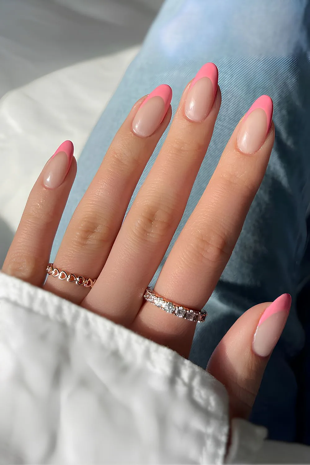 Coral pink French tip nails