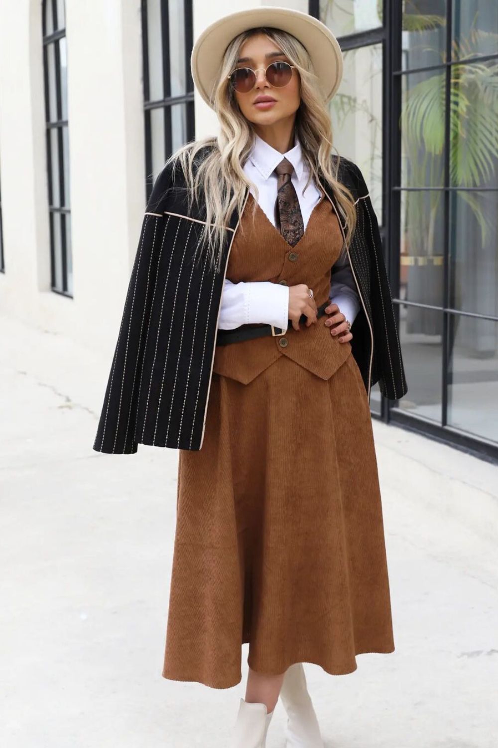 Corduroy skirt-suit and paisley tie