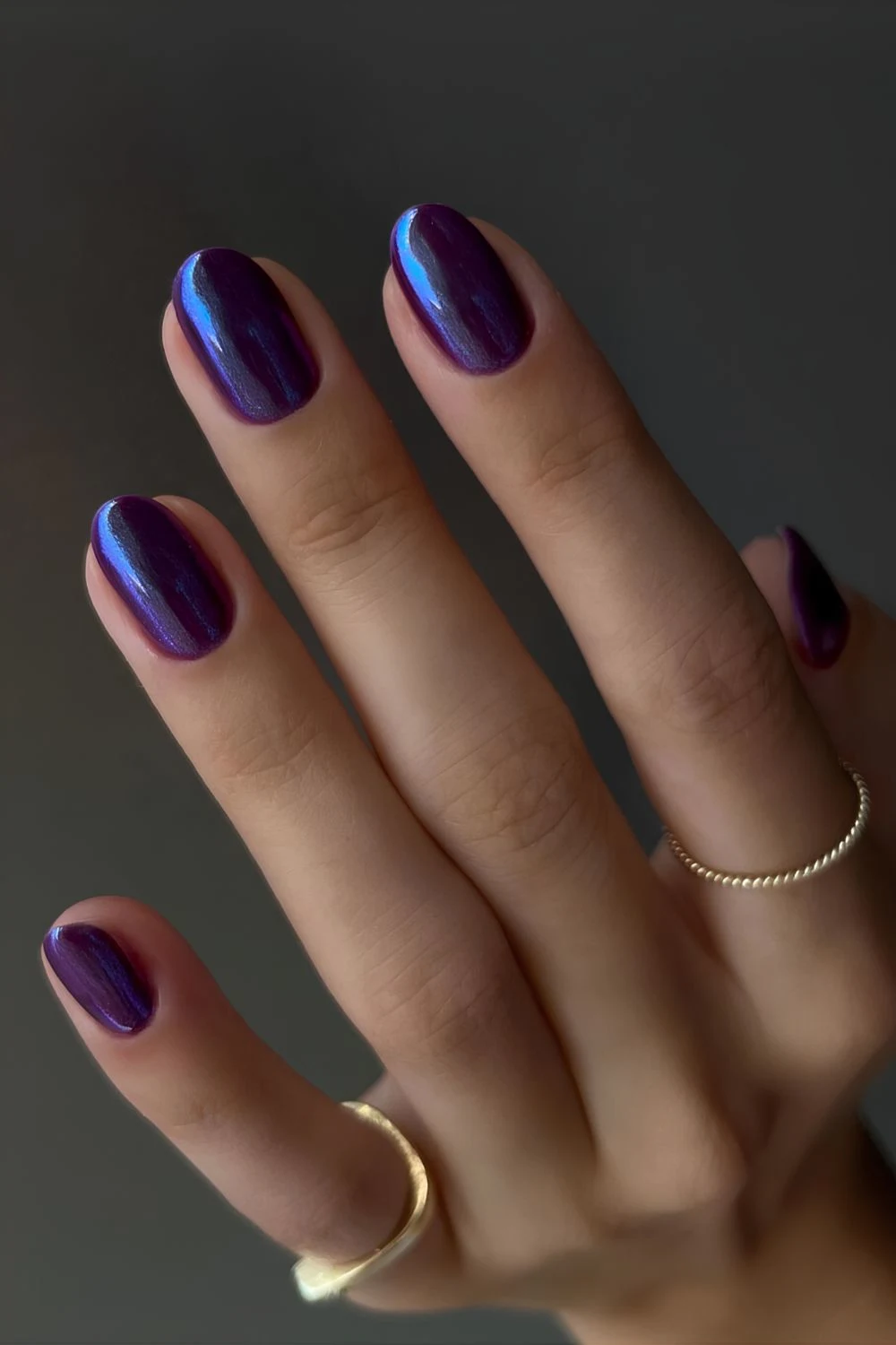 Dark purple chrome manicure
