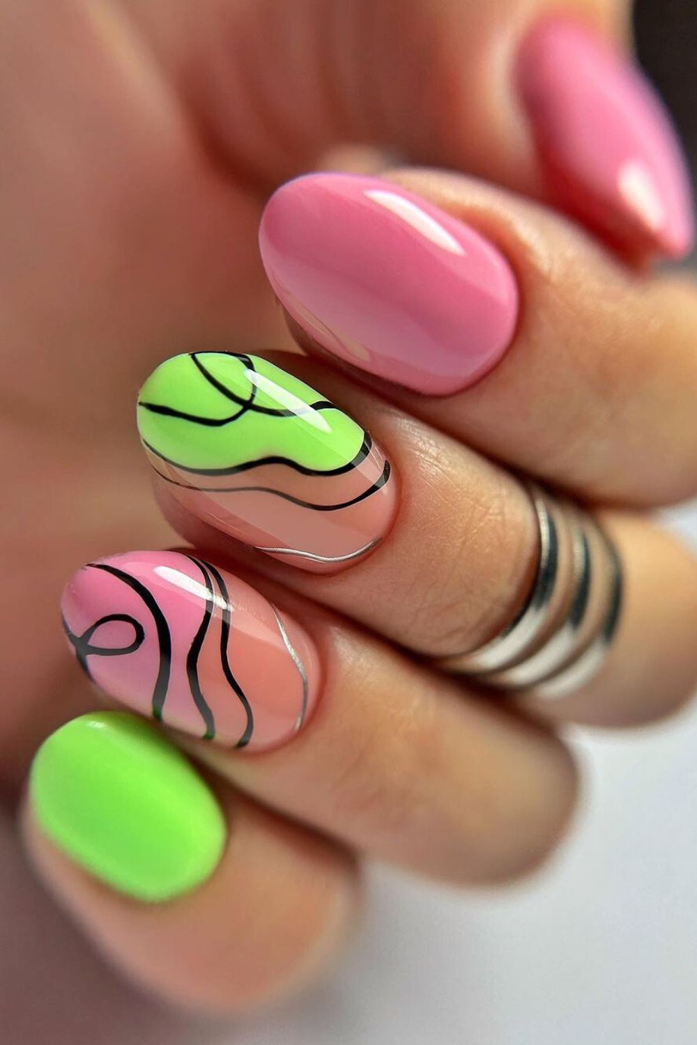 Electric pink and neon green nails