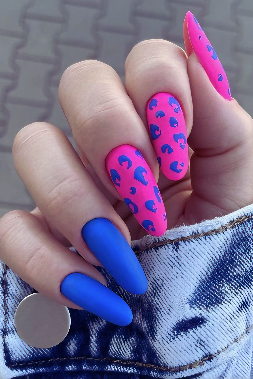 Electric pink and blue leopard nails