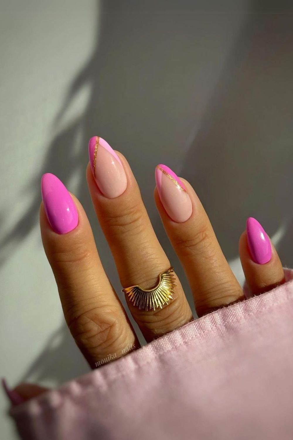 Fuchsia nails with gold line accents