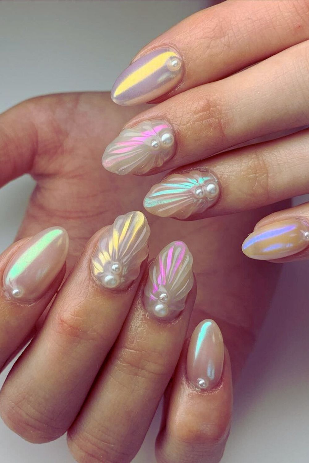 Holographic seashell nails with pearls