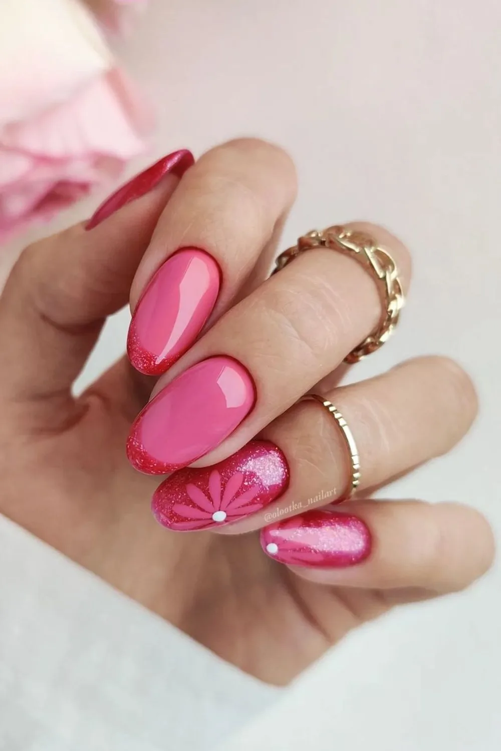 Hot pink nails with floral design