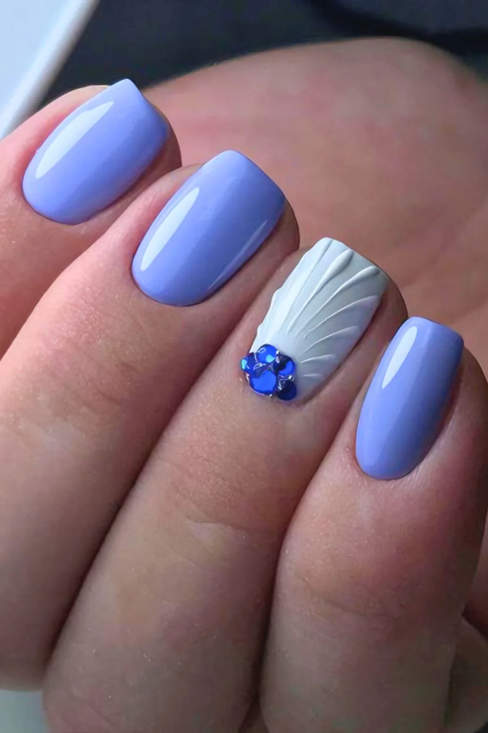 Lavander nails with shell accents