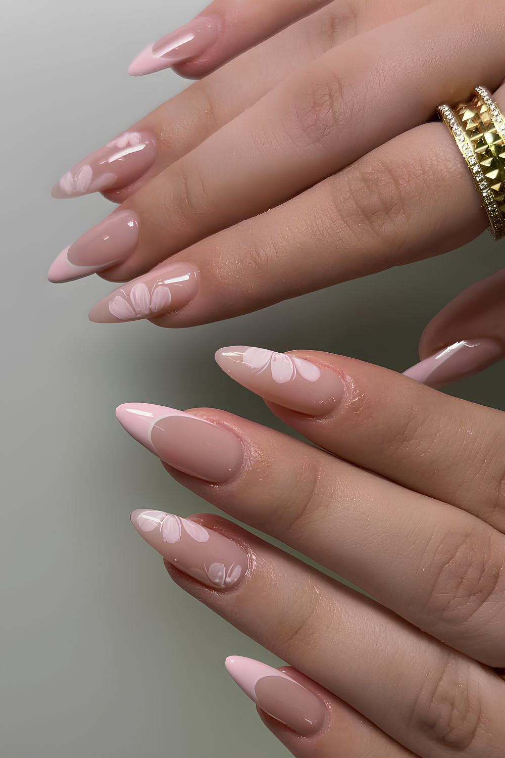 Light pink floral French tip nails