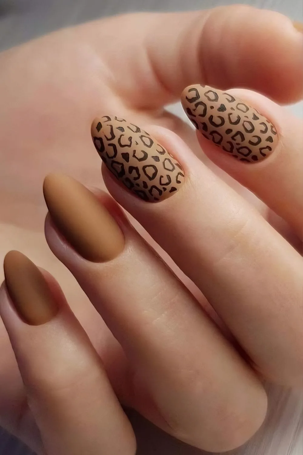 Matte brown nails with leopard spots