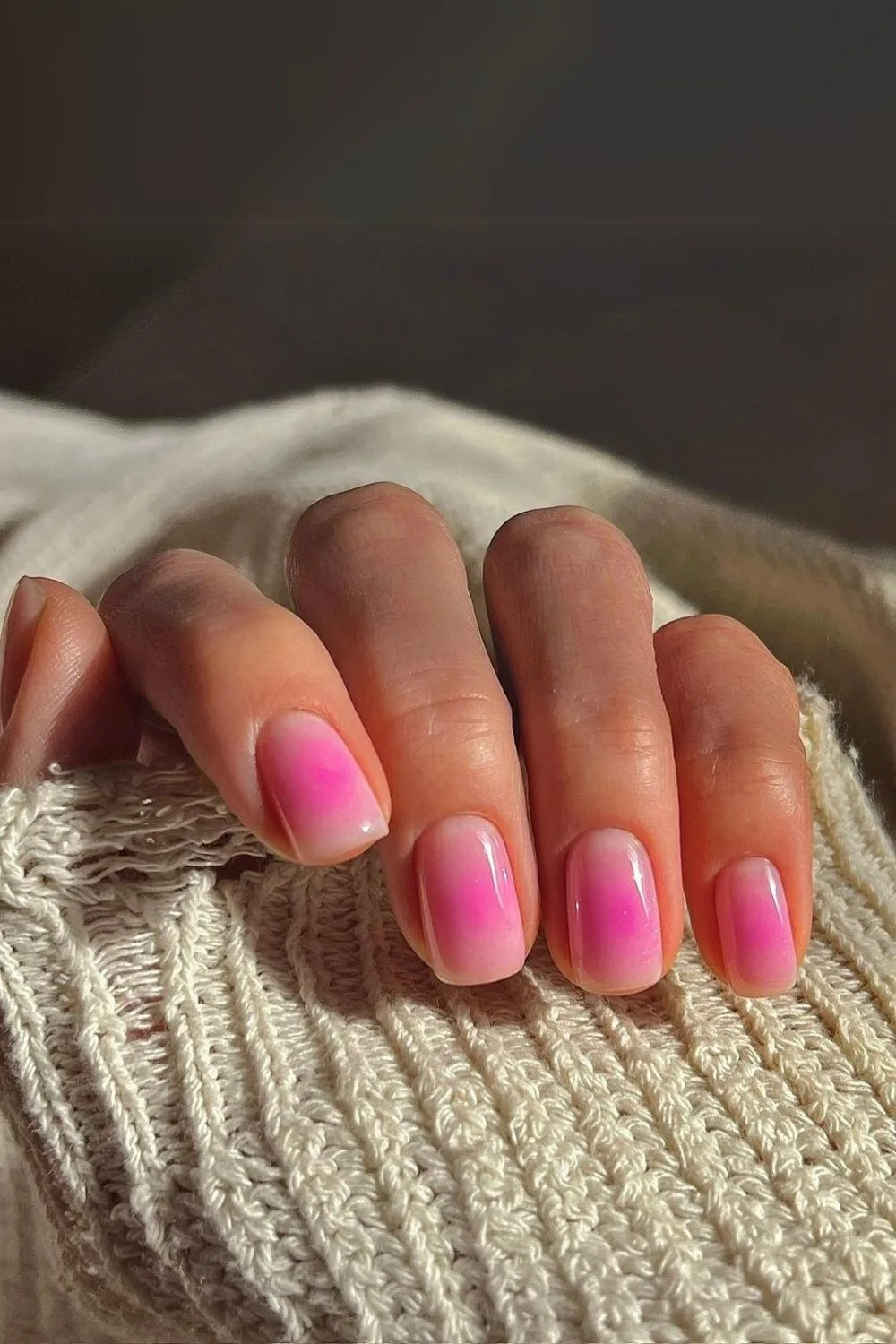 Nude nails with pink blush effect