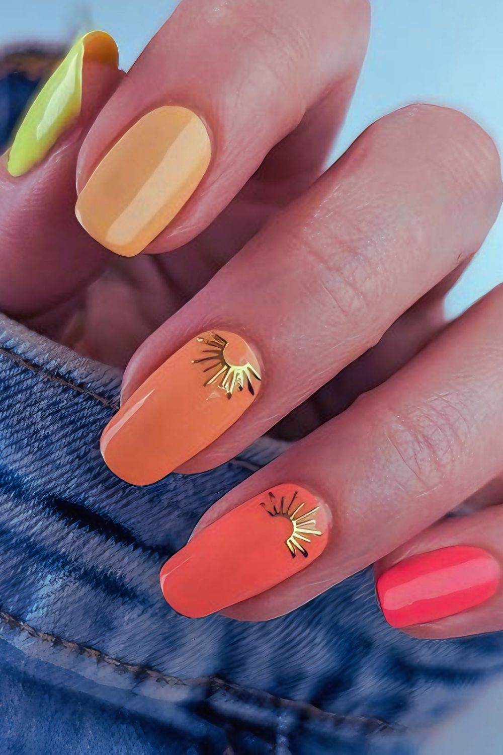 Orange and yellow sunburst nails