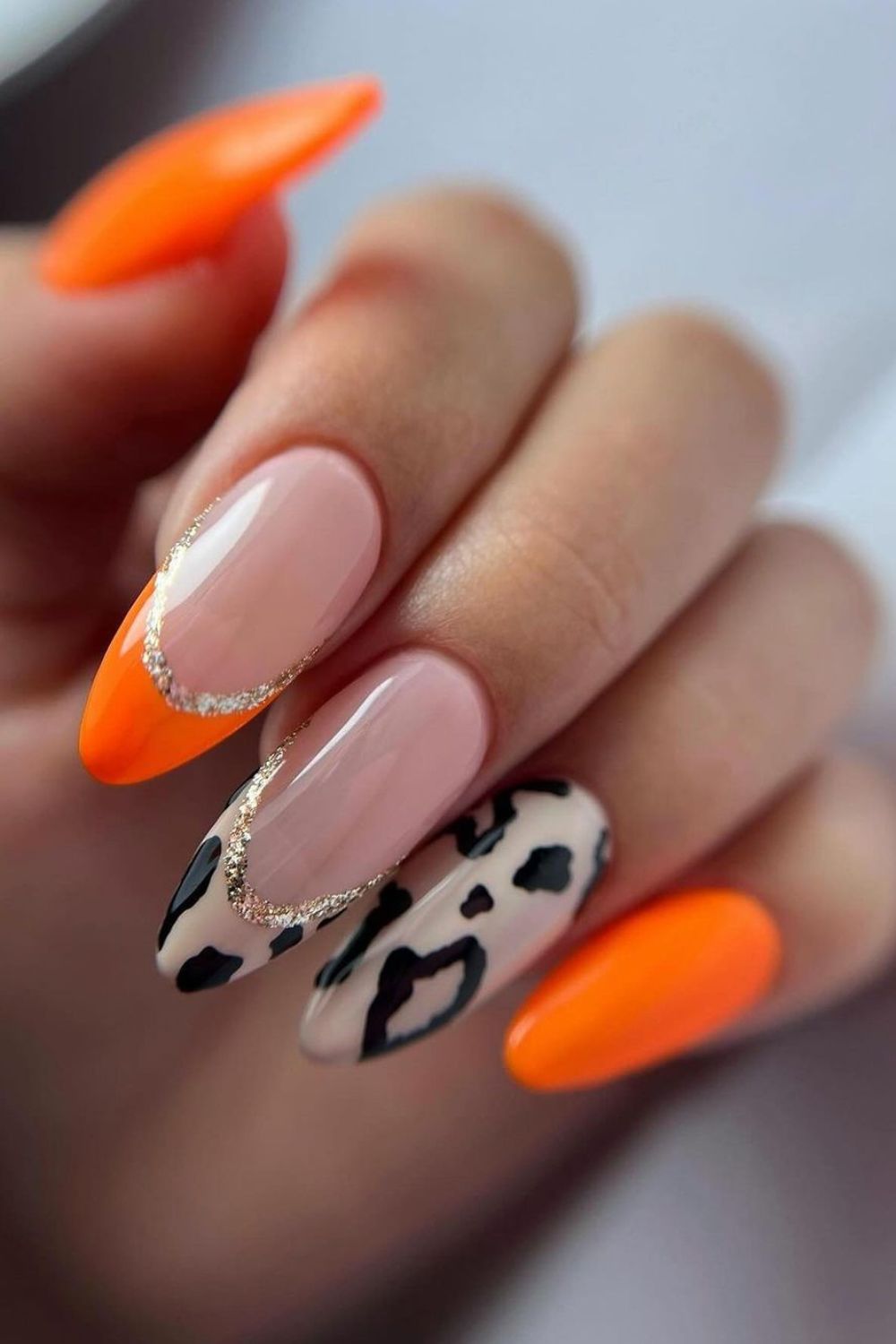 Orange tips with nude leopard print