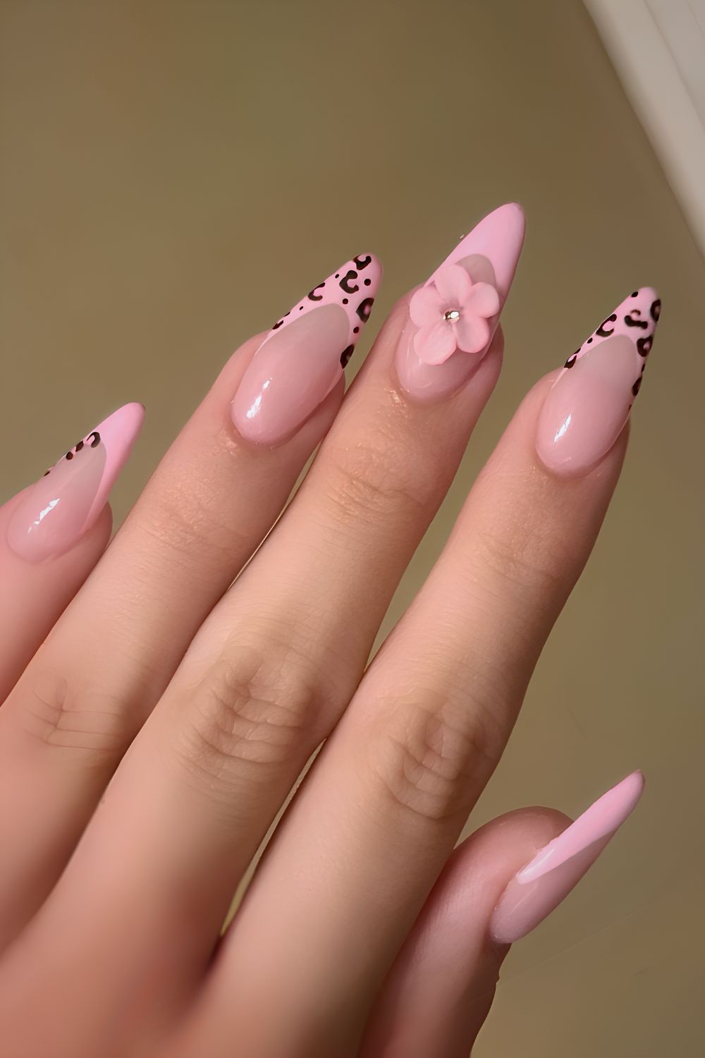 Pink French mani with leopard print accent