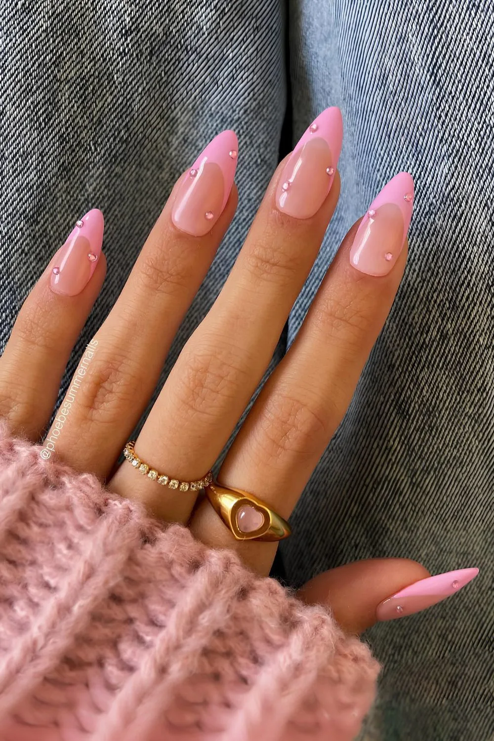 Pink French tip manicure with studs