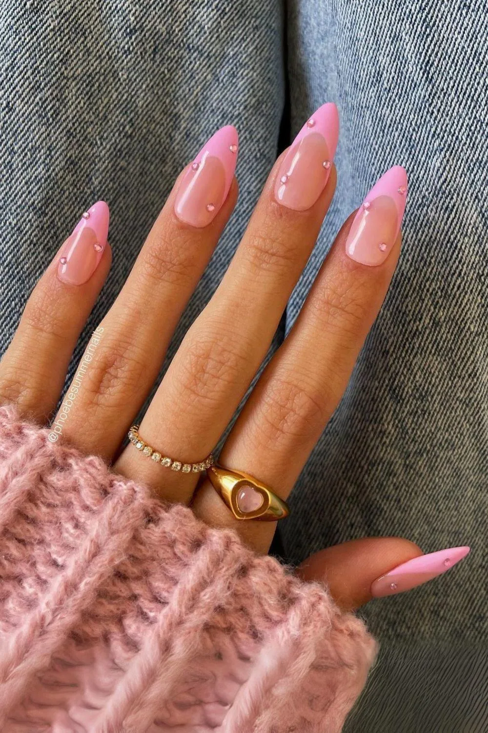 Pink French tip nails with studs