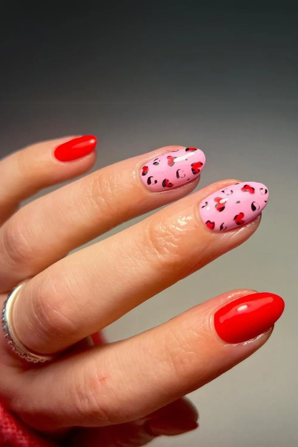 Pink and read leopard print nails