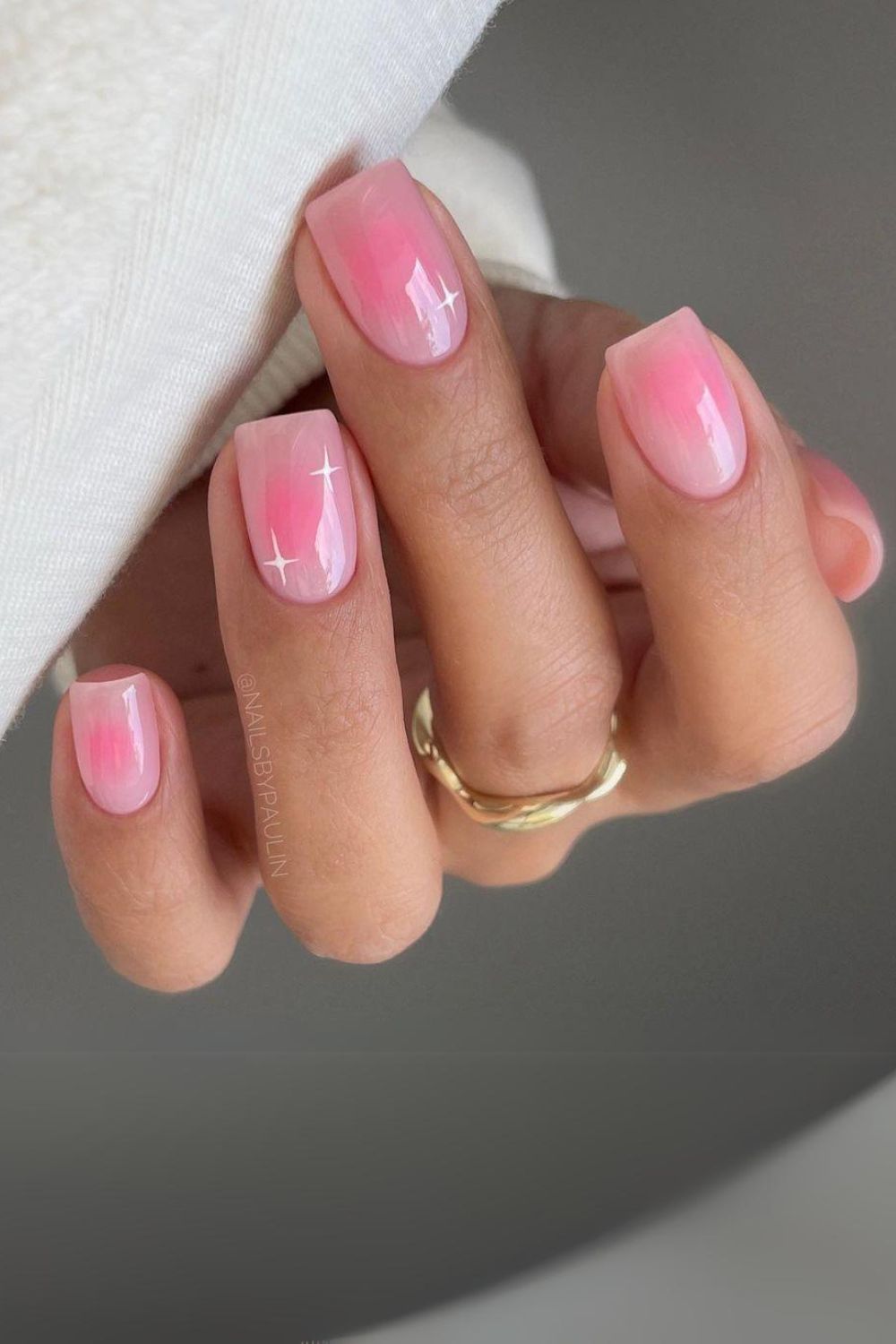 Pink nails with aura effect