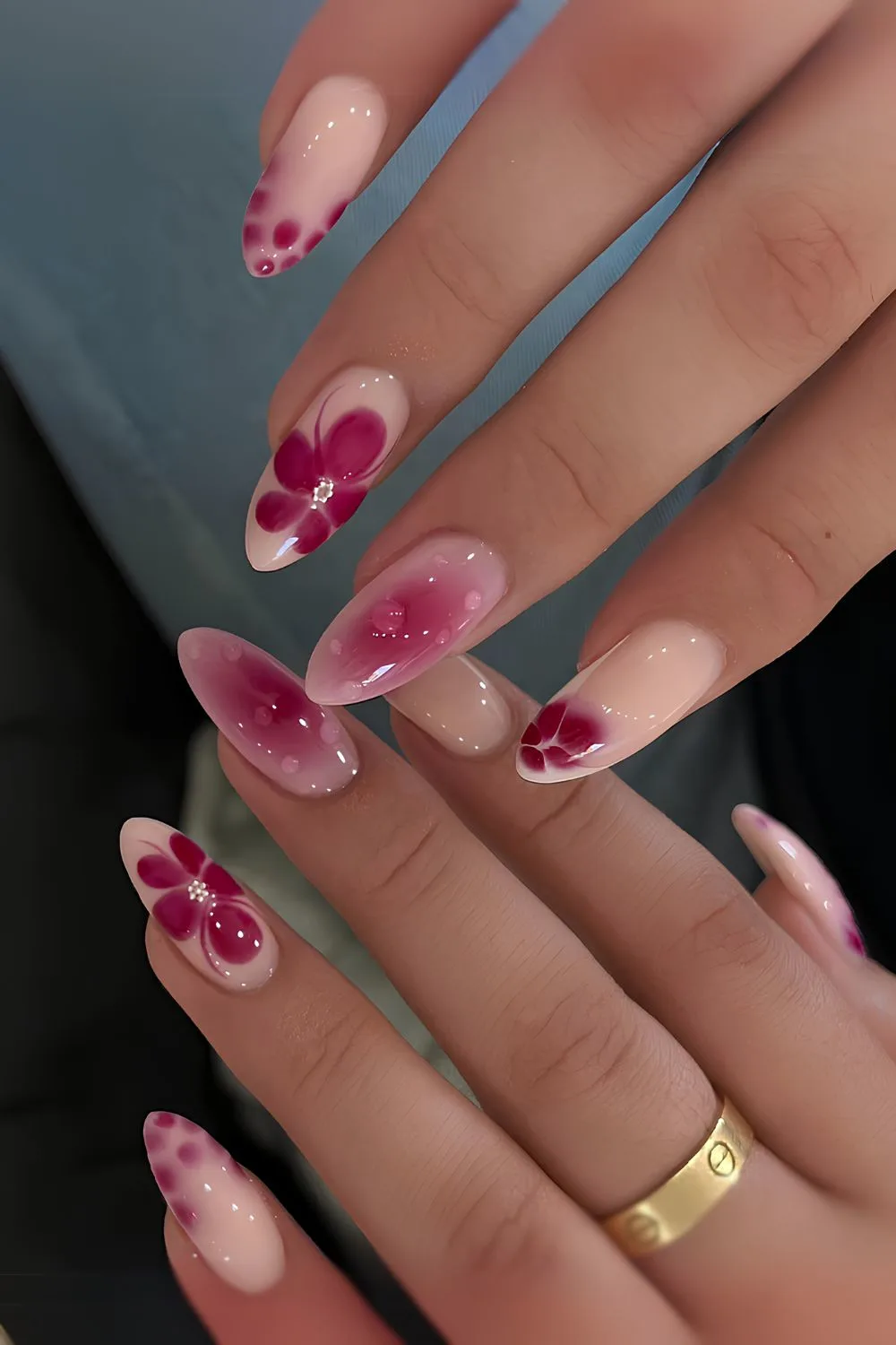 Pink nails with blooming flower accents