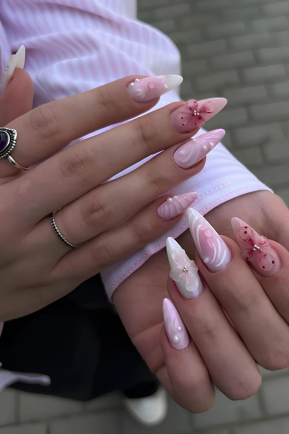 Pink nails with pearls and 3D florals