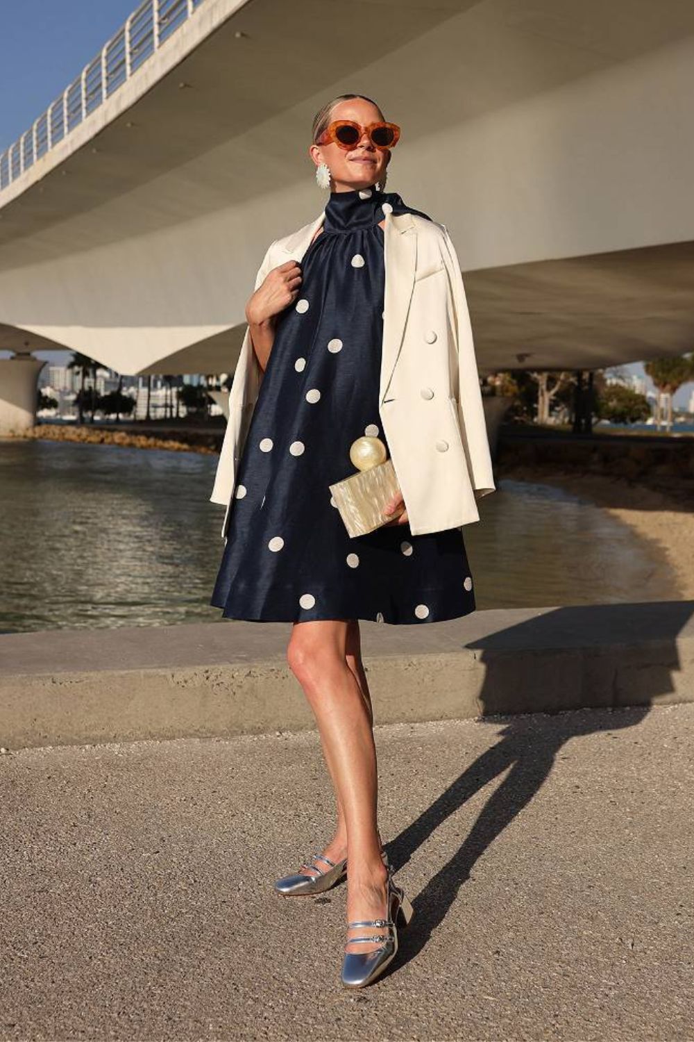 A black and white polka dot dress