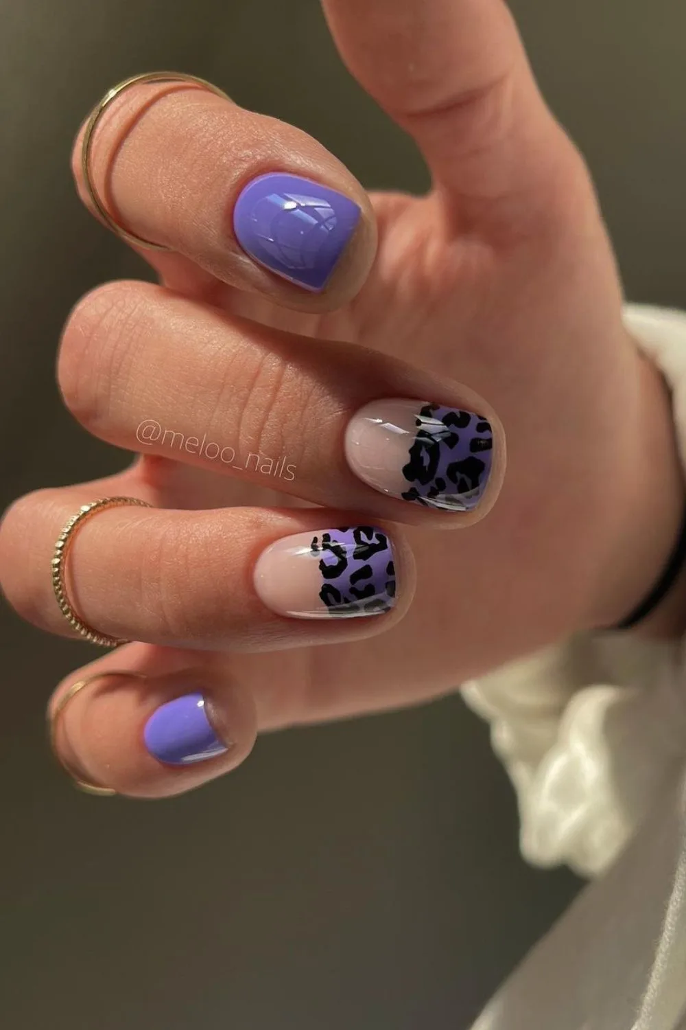 Purple nails with leopard print details