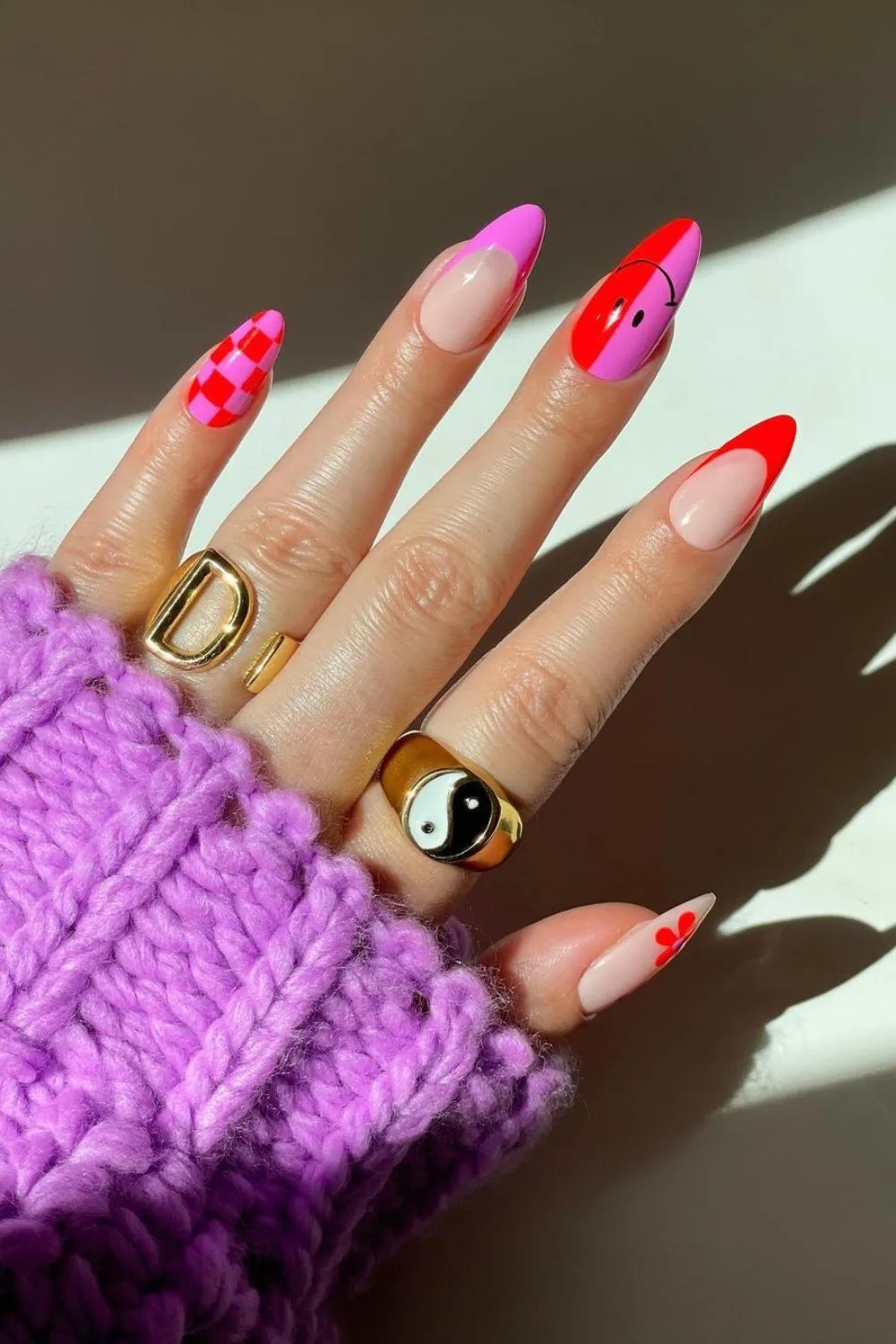 Red and pink smiley nails