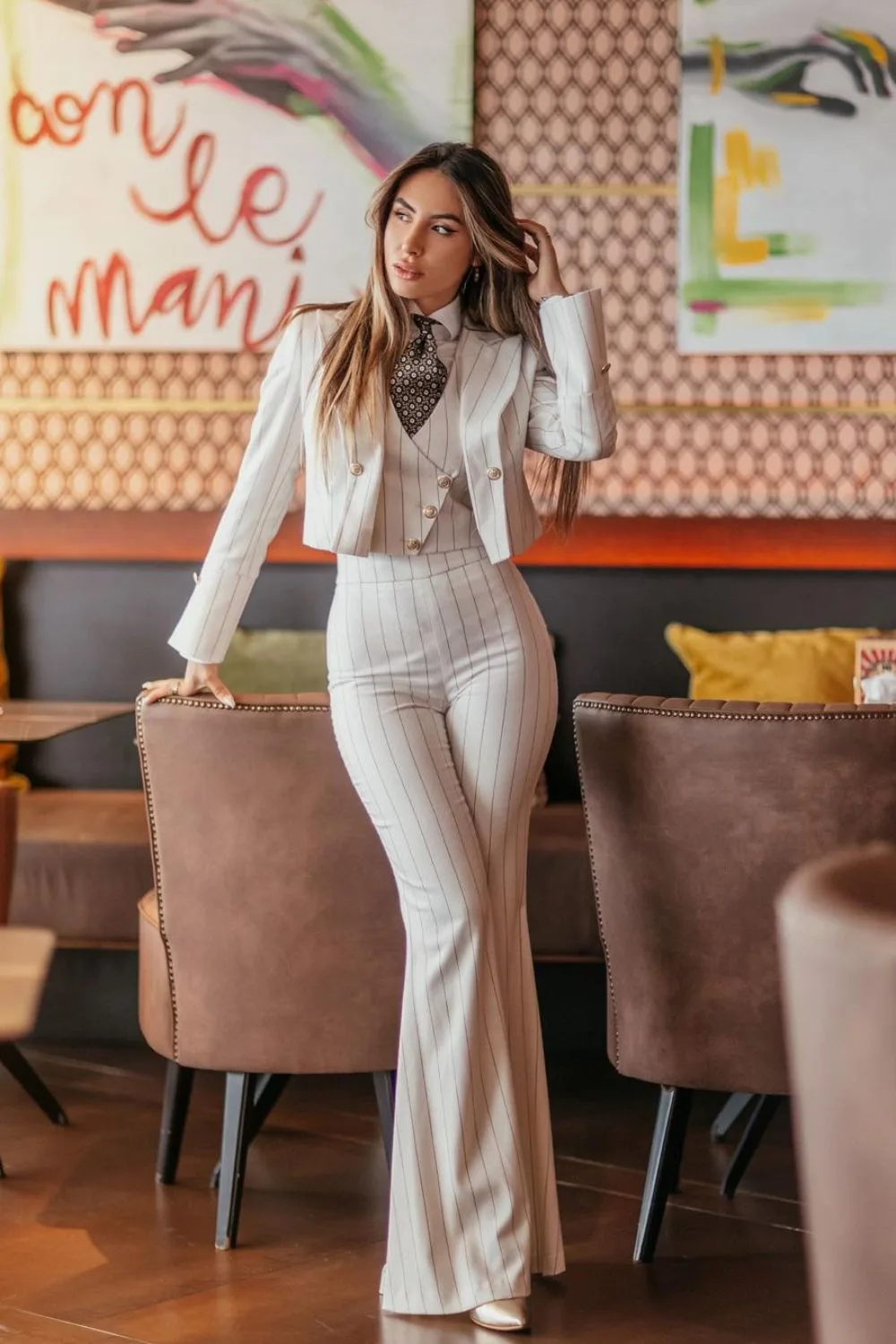 Retro power suit with flare pants and a tie