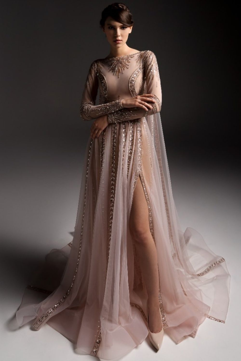 Sheer gown with intricate embellishments