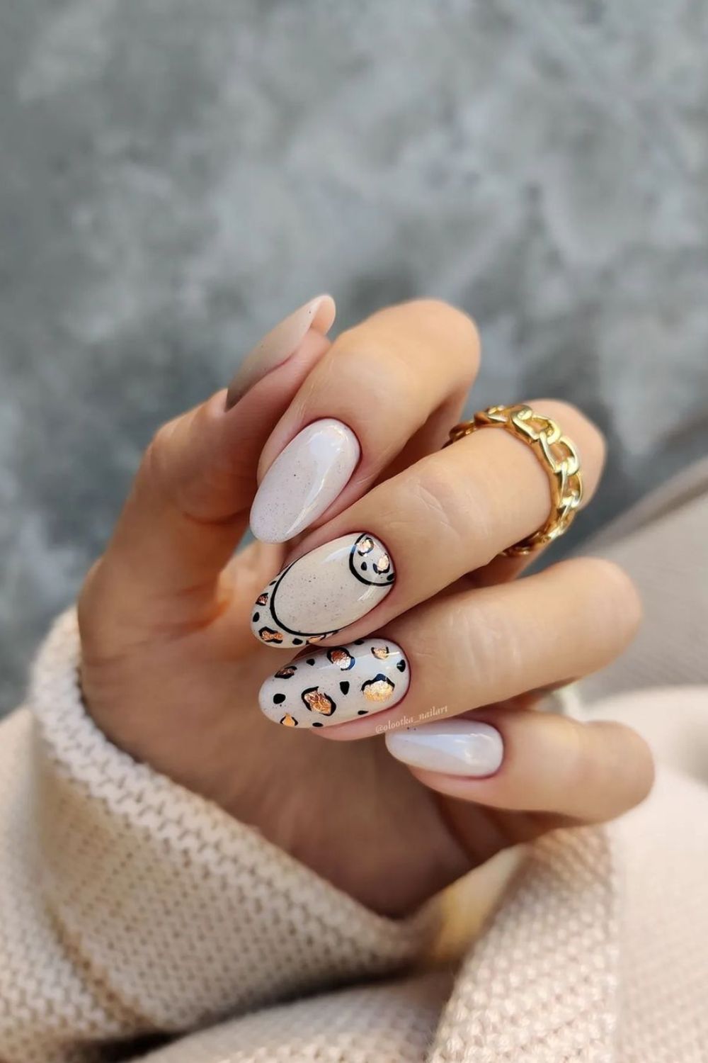 Soft beige nails with leopard print