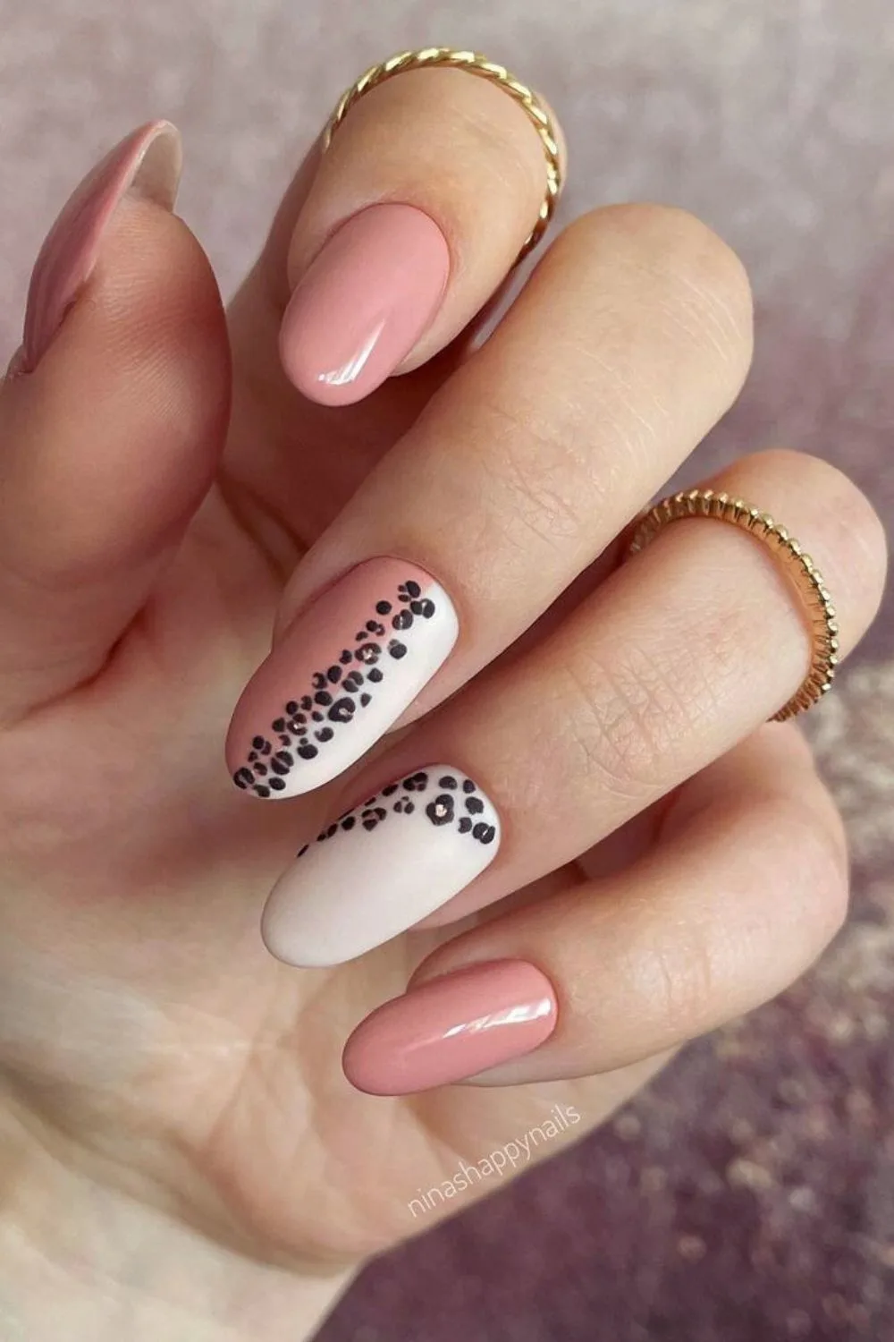 Soft pink and white nails with leopard details