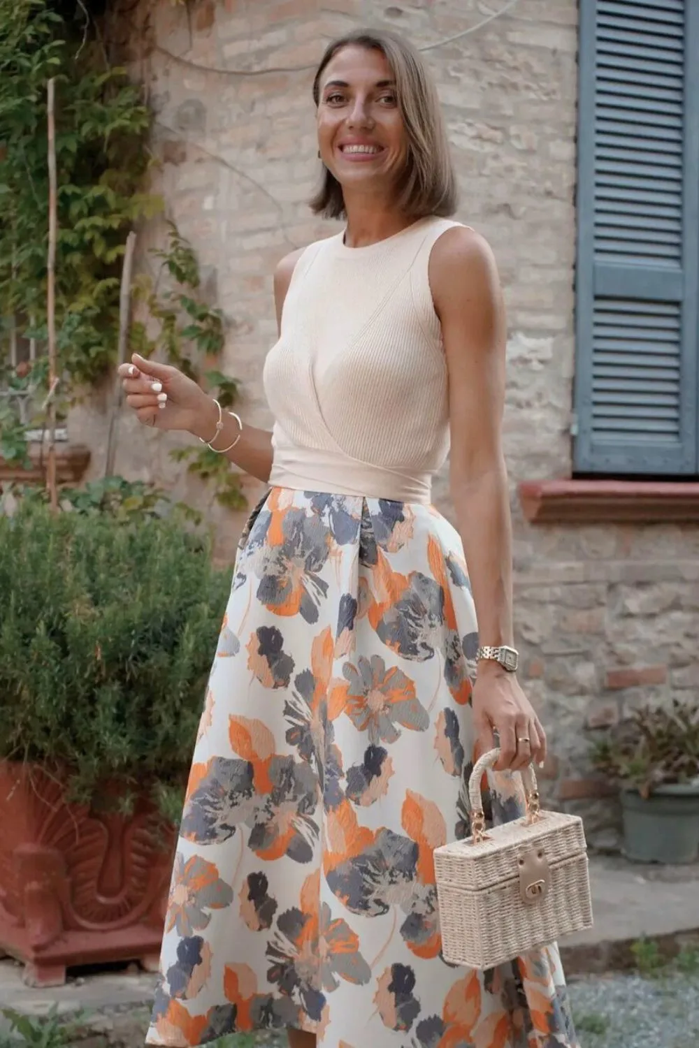 Spring outfit idea with a floral skirt