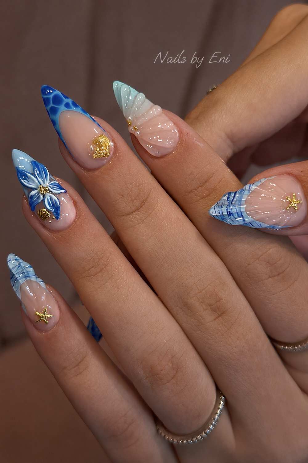 Textured blue French mani with florals and seashells