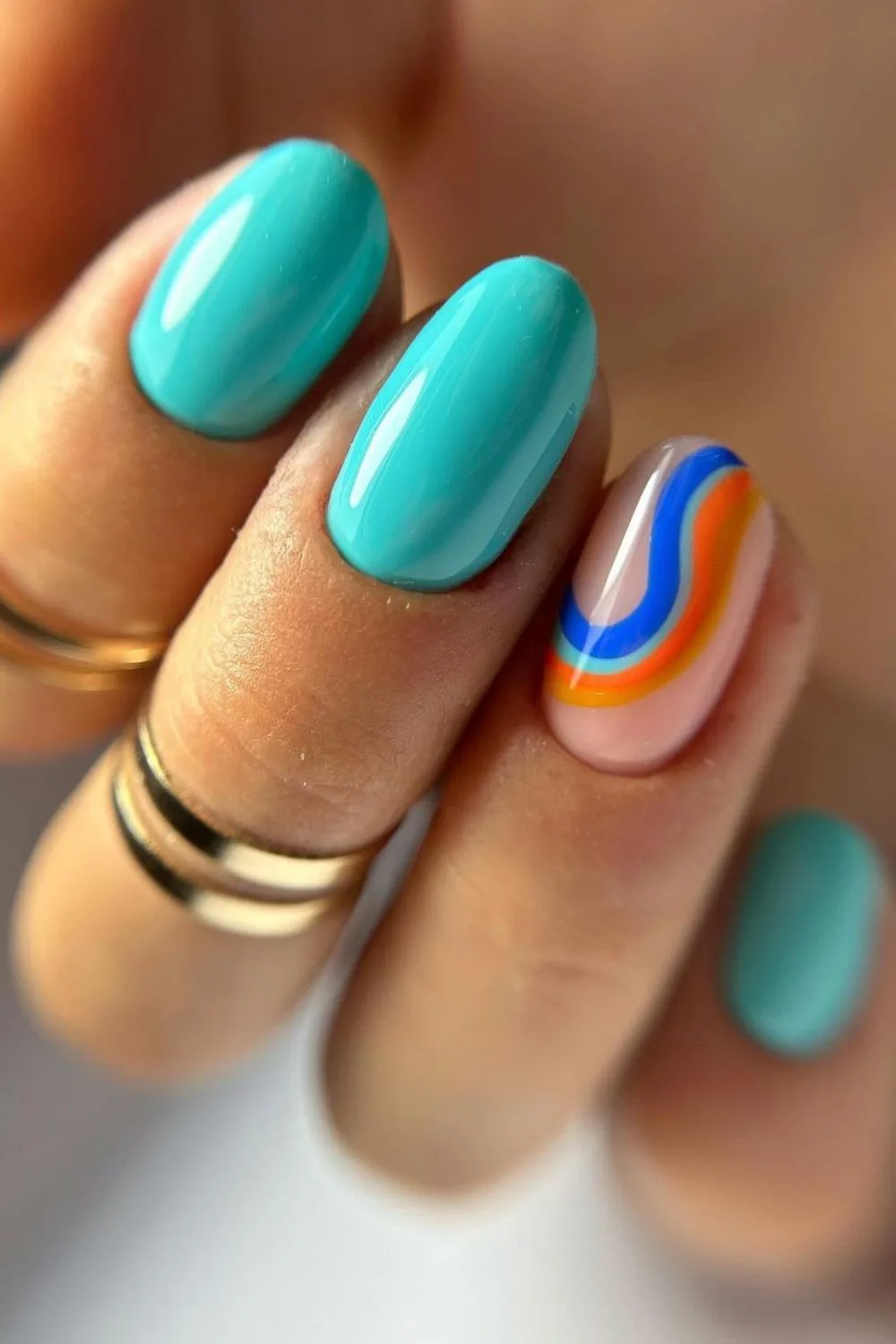 Turquoise and tangerine nails