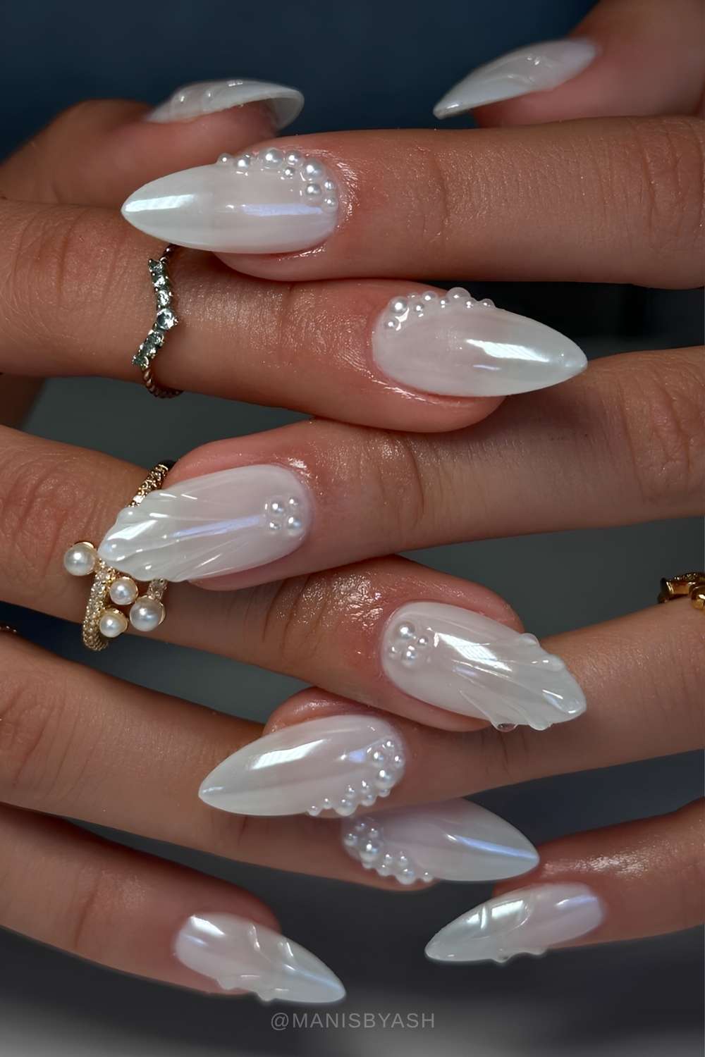 White chrome nails with pearl and seashell art