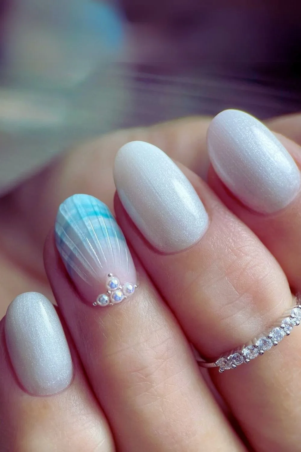 White nails with pearly accents