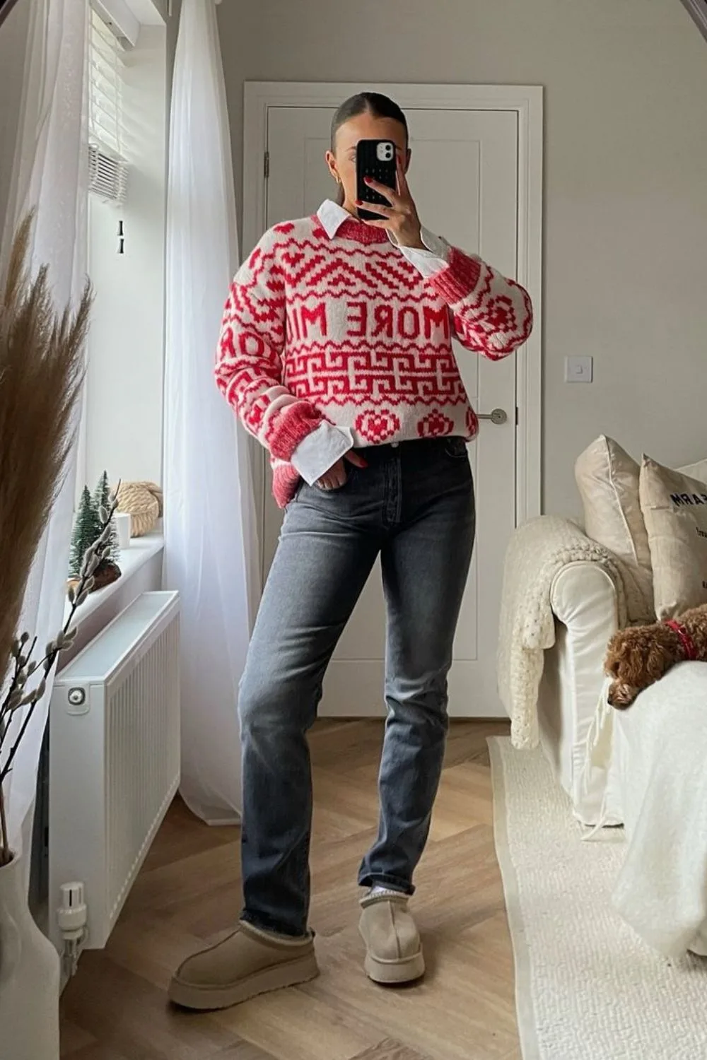 woman in dark denim and red and white jumper