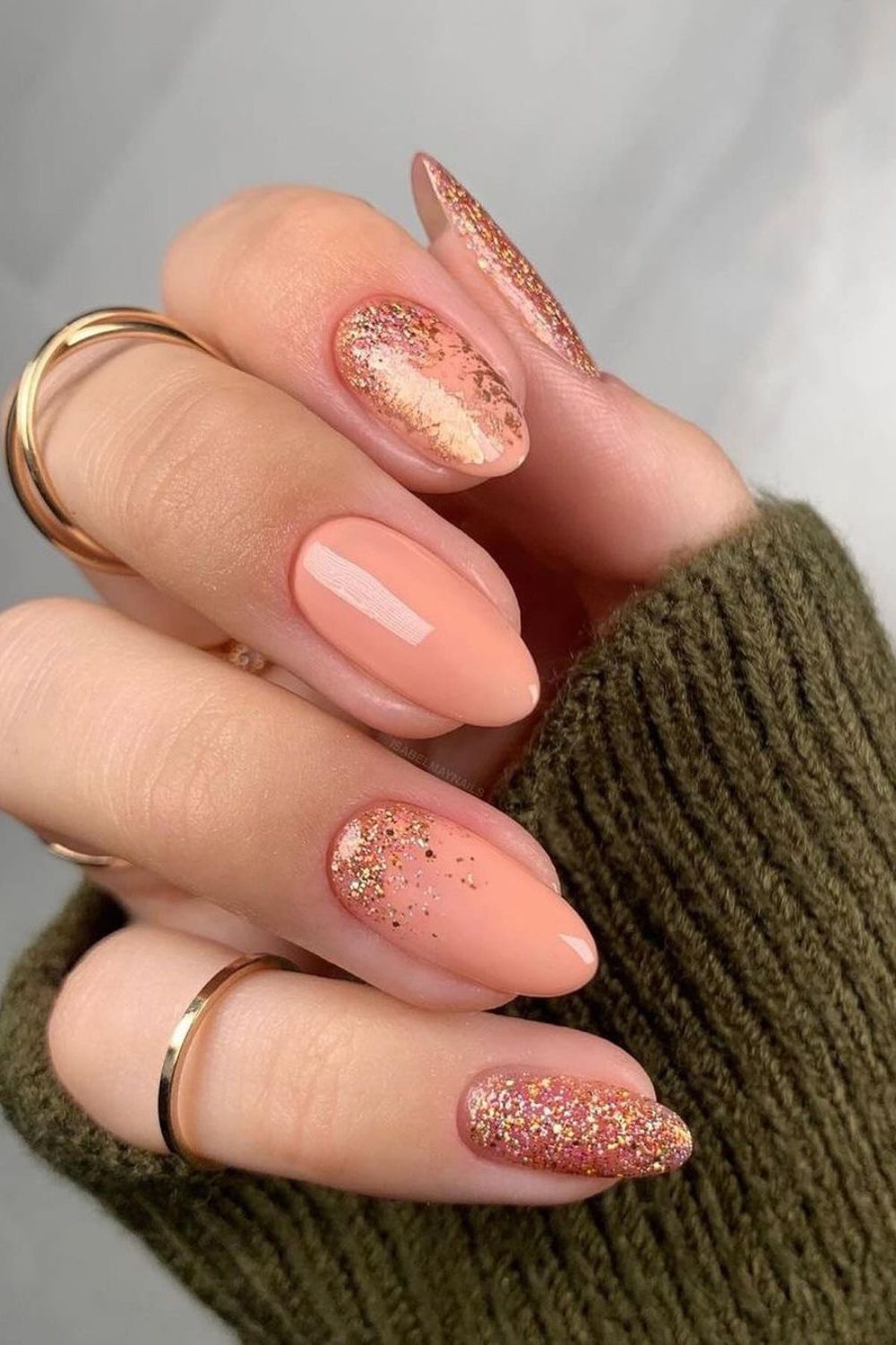 glitter details on peach fuzz nails