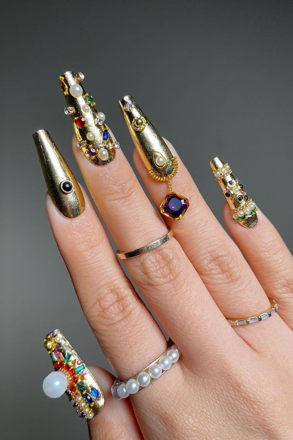 gold nails with pearls in color