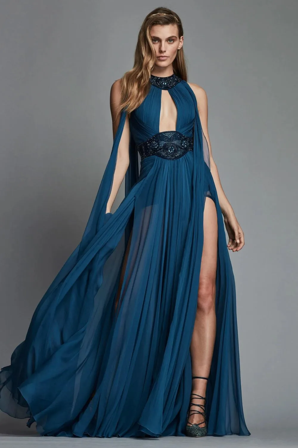 gorgeous woman in a stunning blue gown