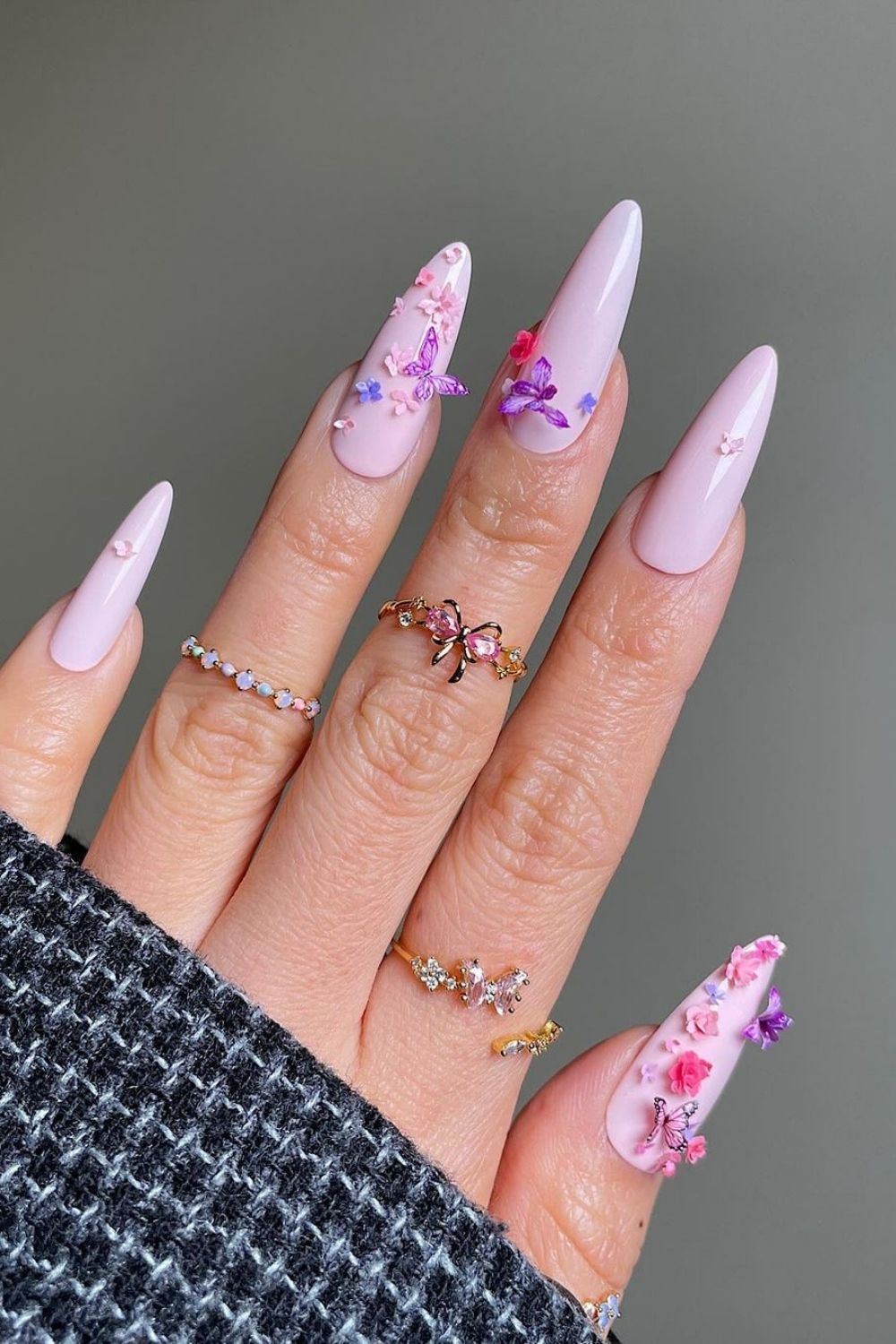 lilac nails with flowers and butterfly