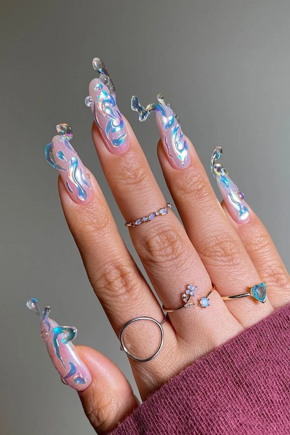 nails in 3d in the shape of waves