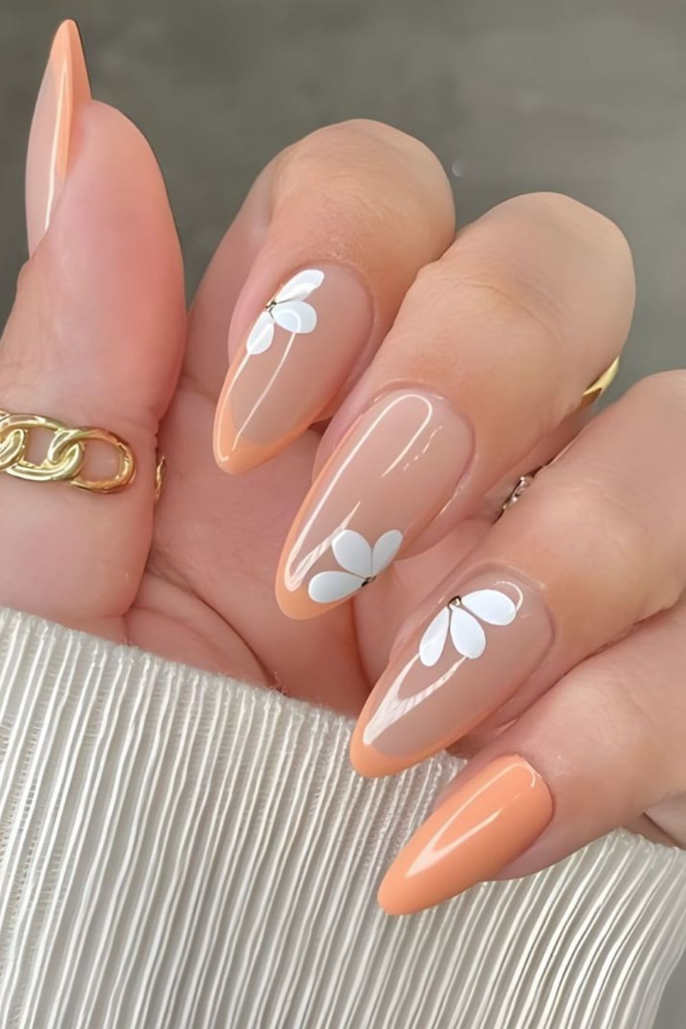 peach fuzz nails with white blossoms