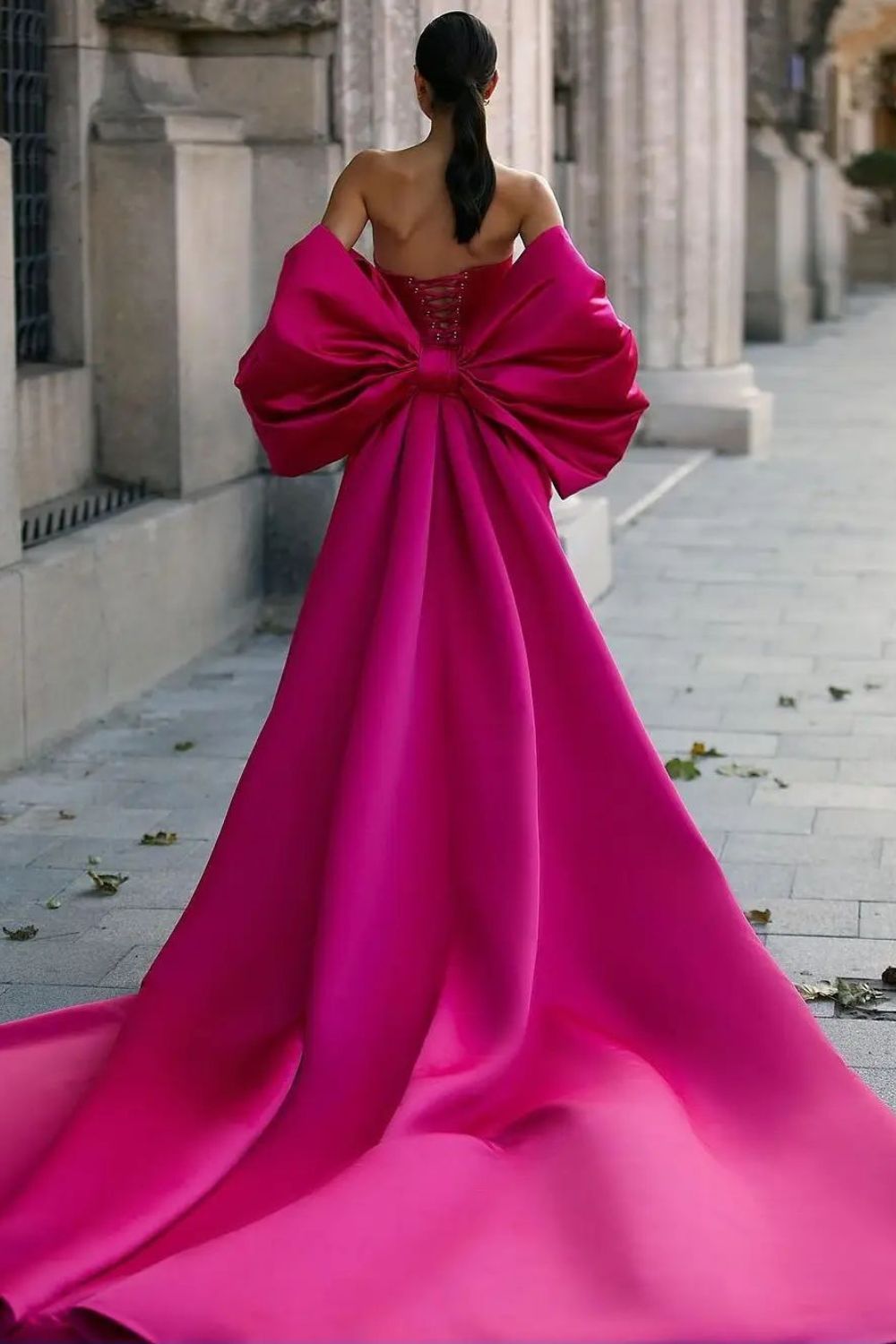 pink dress with huge bow on back