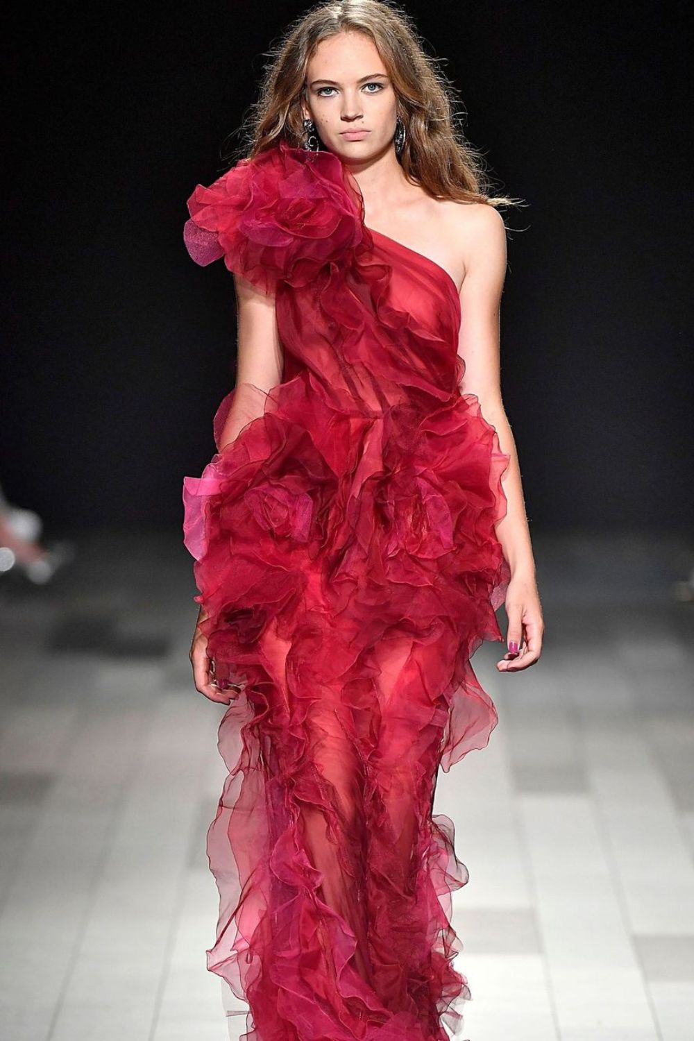 red ruffle dress on a model