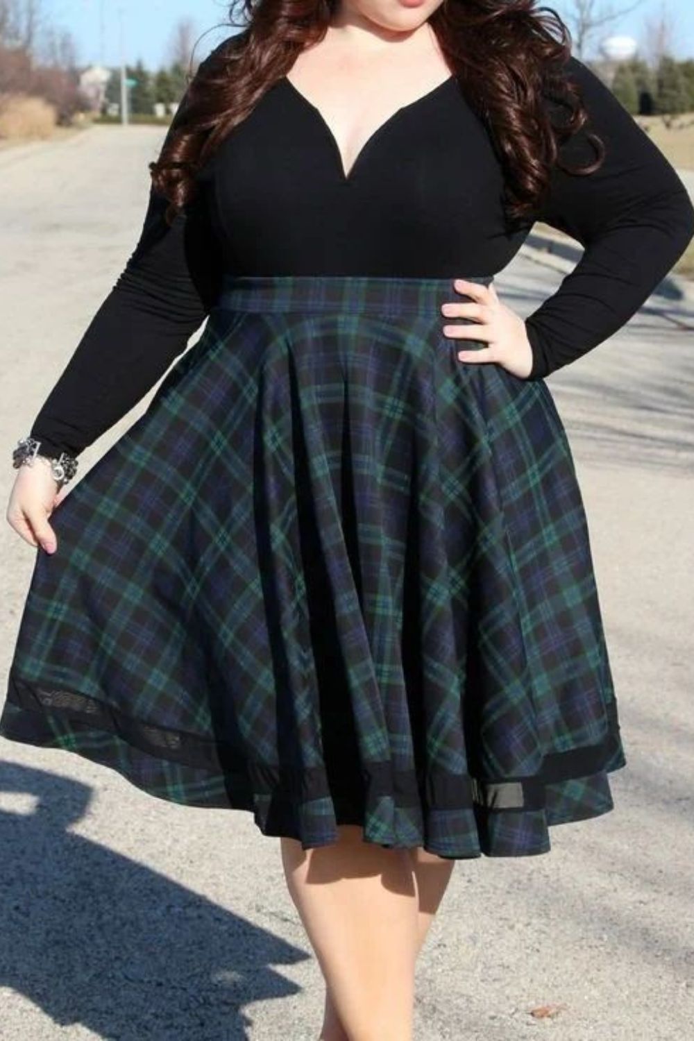 skater skirt and black shirt for apple shape figure