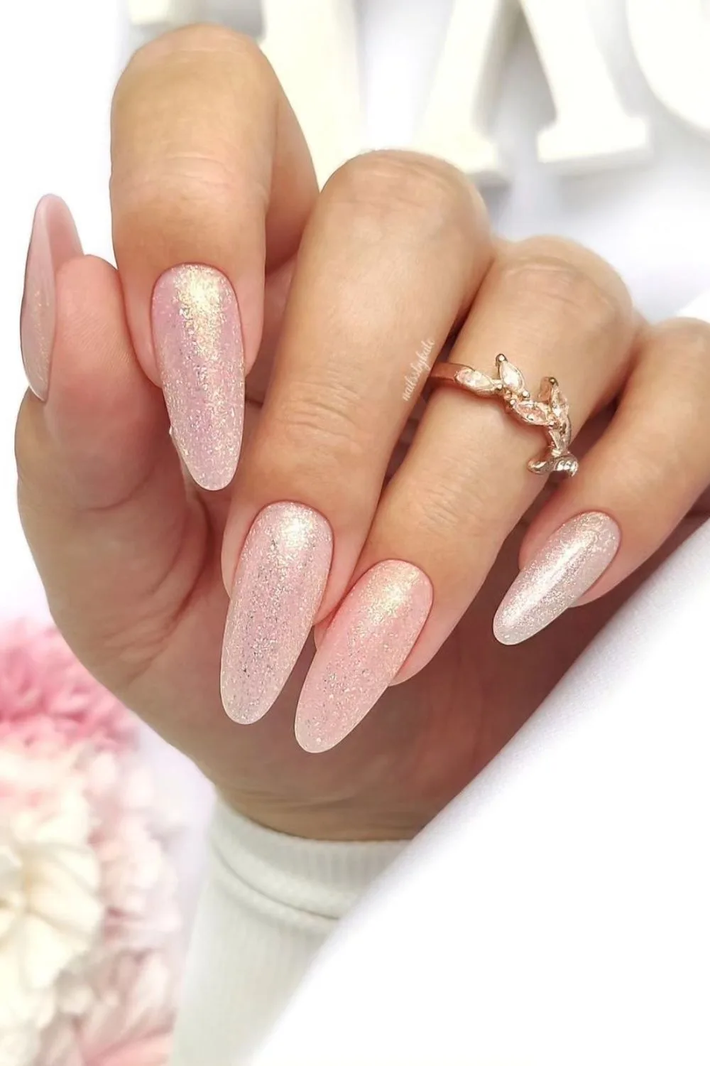 sparkly almond nails with ring