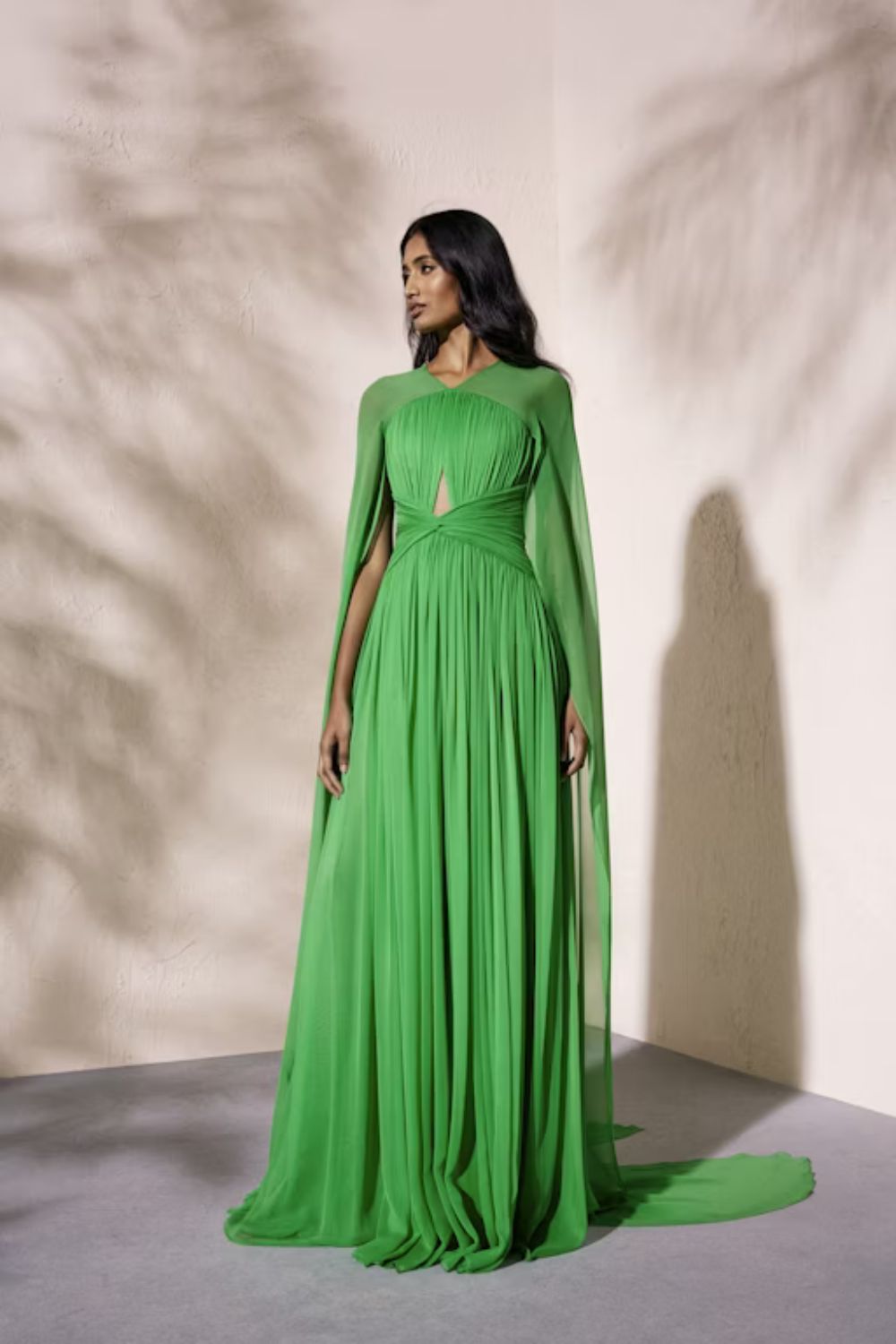 woman posing in beautiful green dress